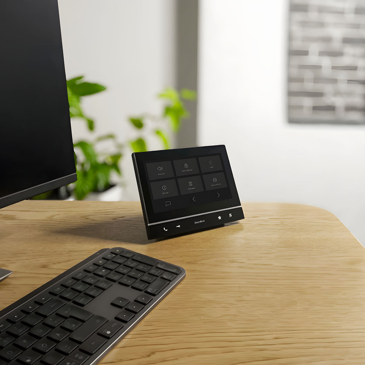 DoorBird A1103 WiFi IP Video Indoor Station, Black Edition on a desk | theelitegateoffers.com