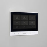 DoorBird A1103 WiFi IP Video Indoor Station, White Edition mounted on a wall | theelitegateoffers.com